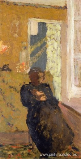 Mujer sentada vestida de negro Mujer sentada vestida de negro