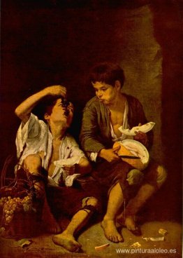 Dos niños comiendo un melón y uvas Dos niños comiendo un melón y uvas