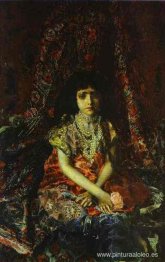 retrato de una niña contra una alfombra persa