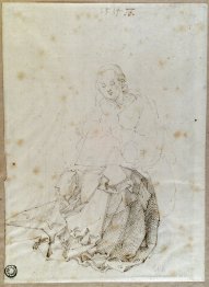 María sentada con el niño