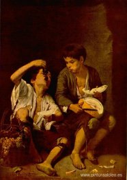 Dos niños comiendo un melón y uvas