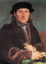 Joven desconocido en su escritorio de oficina