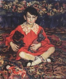 Retrato de una niña sentada sobre una alfombra colorida con los