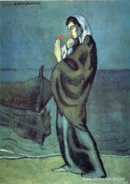 Madre e hijo en la playa.