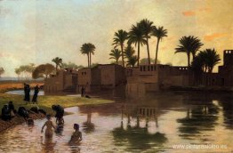 Bañistas al borde de un río
