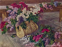 Lilas en un bolso en el suelo.