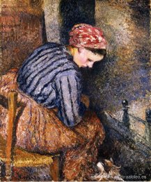 Mujer campesina calentándose