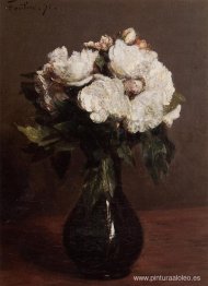 Rosas blancas en un jarrón verde.