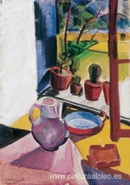 Macetas en el alféizar de la ventana Macetas en el alféizar de la ventana