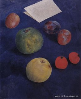 Fruta sobre un mantel azul Fruta sobre un mantel azul