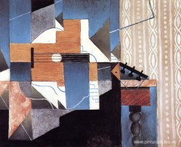 Guitarra sobre la mesa Guitarra sobre la mesa