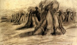 Stooks y un campesino apilando gavillas Stooks y un campesino apilando gavillas