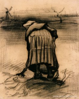 Mujer campesina levantando patatas Mujer campesina levantando patatas