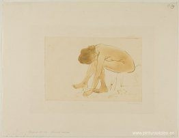 Mujer sentada limpiándose los pies Mujer sentada limpiándose los pies