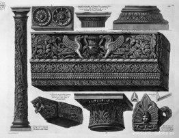 Un friso con arquitrabe, columna, dos capiteles, una cama, una e Un friso con arquitrabe, columna, dos capiteles, una cama, una e