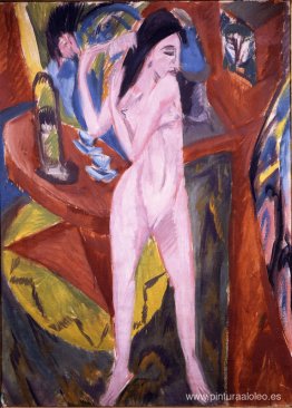 Mujer desnuda peinándose Mujer desnuda peinándose