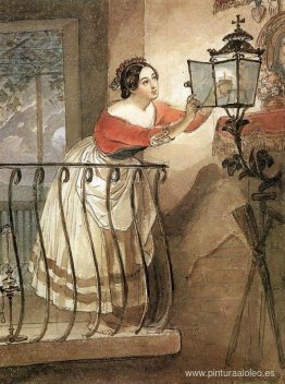 Mujer italiana encendiendo una lámpara frente a la imagen de la Mujer italiana encendiendo una lámpara frente a la imagen de la