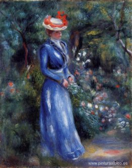 Mujer con un vestido azul, de pie en el jardín de Saint Cloud Mujer con un vestido azul, de pie en el jardín de Saint Cloud