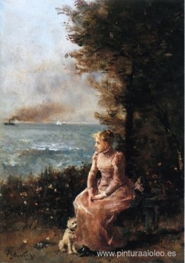 Una joven sentada junto a un árbol. Una joven sentada junto a un árbol.