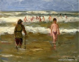 Niños bañándose con el guardián de la playa Niños bañándose con el guardián de la playa