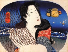 Mujer reparando una red de pesca Mujer reparando una red de pesca