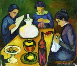 Tres mujeres en la mesa junto a la lámpara. Tres mujeres en la mesa junto a la lámpara.