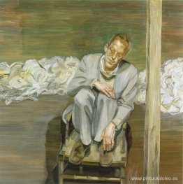 Hombre pelirrojo en una silla Hombre pelirrojo en una silla