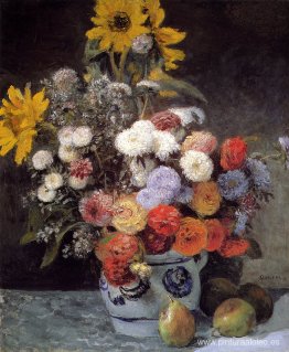 Flores mixtas en una maceta de barro Flores mixtas en una maceta de barro