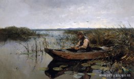 Pescador en un poldercanal Pescador en un poldercanal