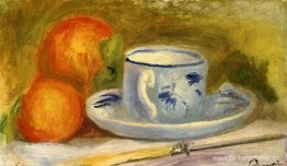 Taza y naranjas Taza y naranjas