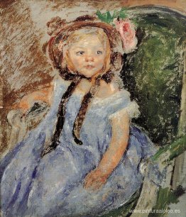 Sara con gorro oscuro con la mano derecha en el brazo de la sill Sara con gorro oscuro con la mano derecha en el brazo de la sill