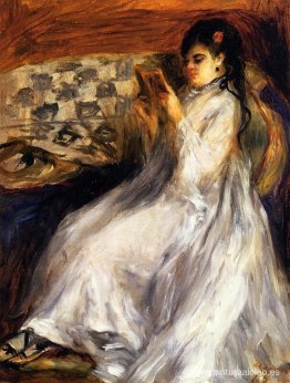 Mujer joven en blanco leyendo Mujer joven en blanco leyendo