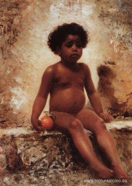 Niño árabe con una naranja Niño árabe con una naranja