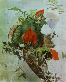 Flores rojas y hojas de begonia en una canasta. Flores rojas y hojas de begonia en una canasta.