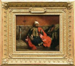 Turco sentado fumando en un sofá Turco sentado fumando en un sofá