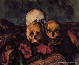 Tres calaveras sobre una alfombra estampada Tres calaveras sobre una alfombra estampada