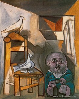 Un niño con palomas. Un niño con palomas.