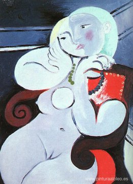 Desnudo femenino sentado en un sillón rojo Desnudo femenino sentado en un sillón rojo
