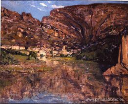 Pequeño pueblo al pie del acantilado Pequeño pueblo al pie del acantilado