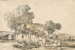 Cabaña con valla de madera entre árboles Cabaña con valla de madera entre árboles