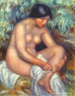 Bañista limpiando una herida Bañista limpiando una herida